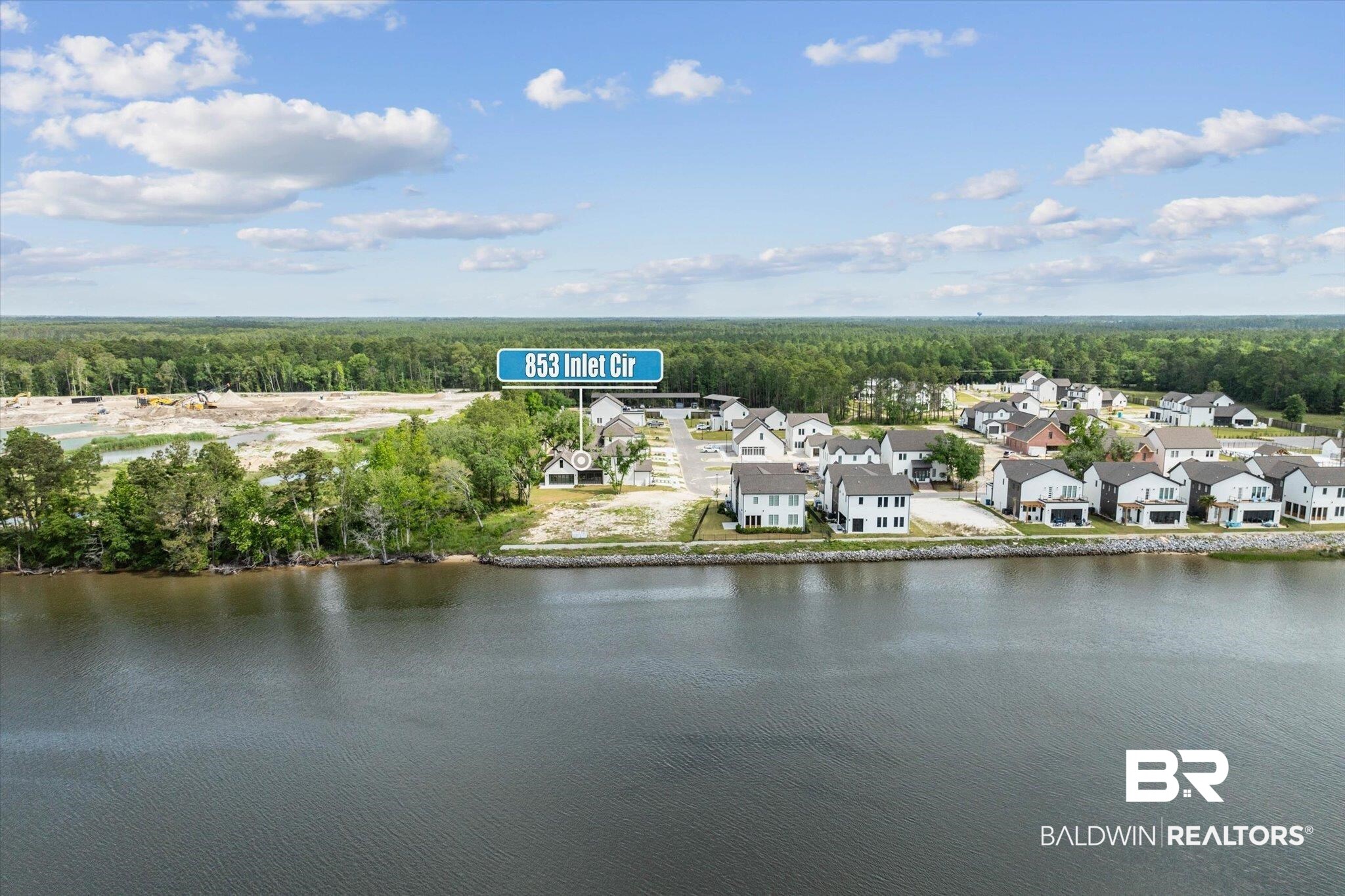 853 Inlet Circle Gulf Shores, AL 36542 - Photo 50 of 55 Drone / aerial view featuring a water view, a residential view, and a forest view