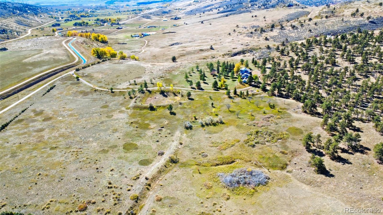 407 Del Rio Road Berthoud, CO 80513 - Photo 8 of 13 a view of aerial view of residential houses with outdoor space