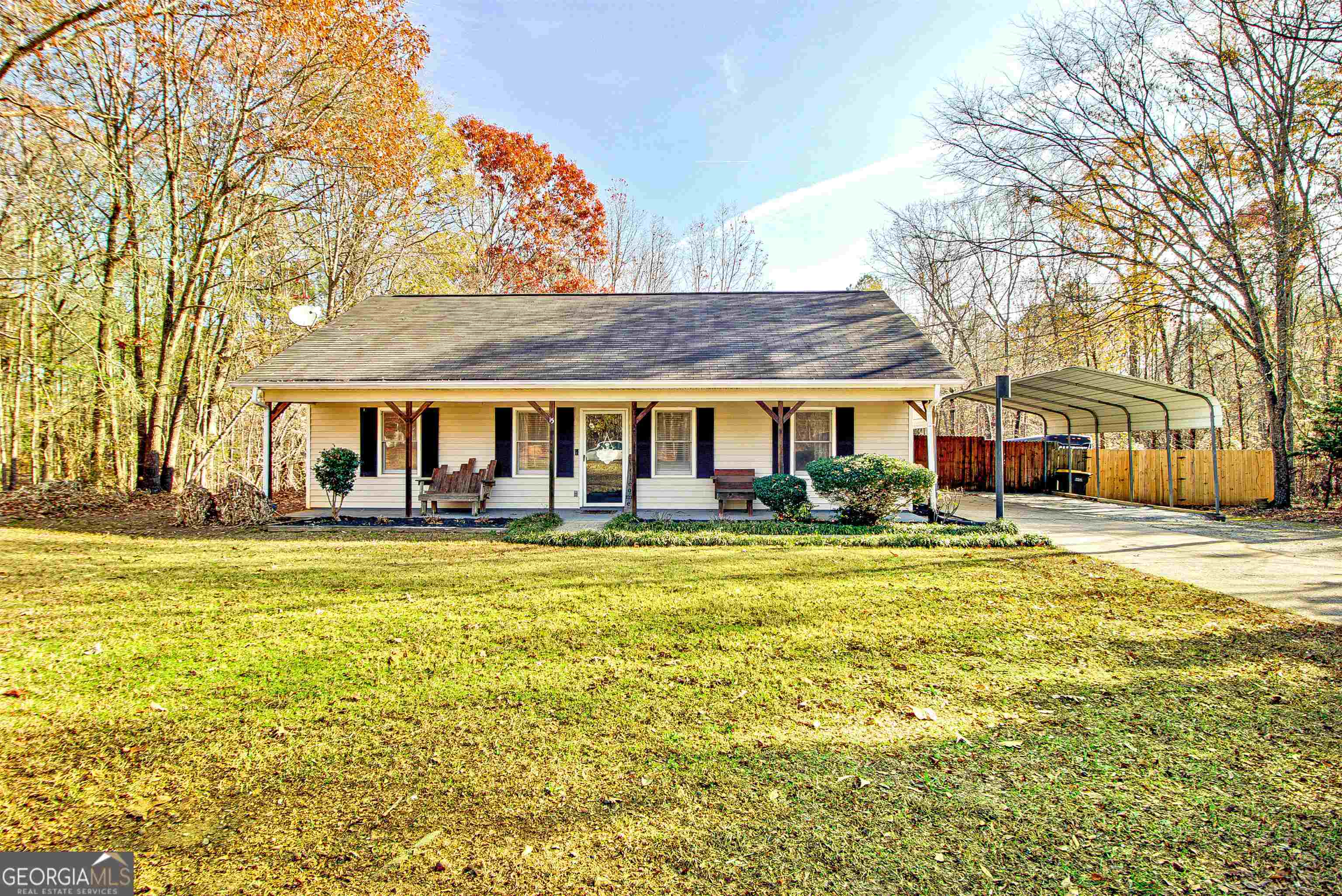 a front view of a house with swimming pool