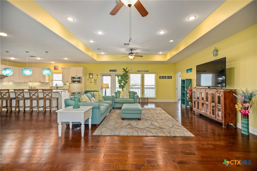 23 Macey Street Port O'Connor, TX 77982 - Photo 19 of 47 a living room with furniture and a flat screen tv