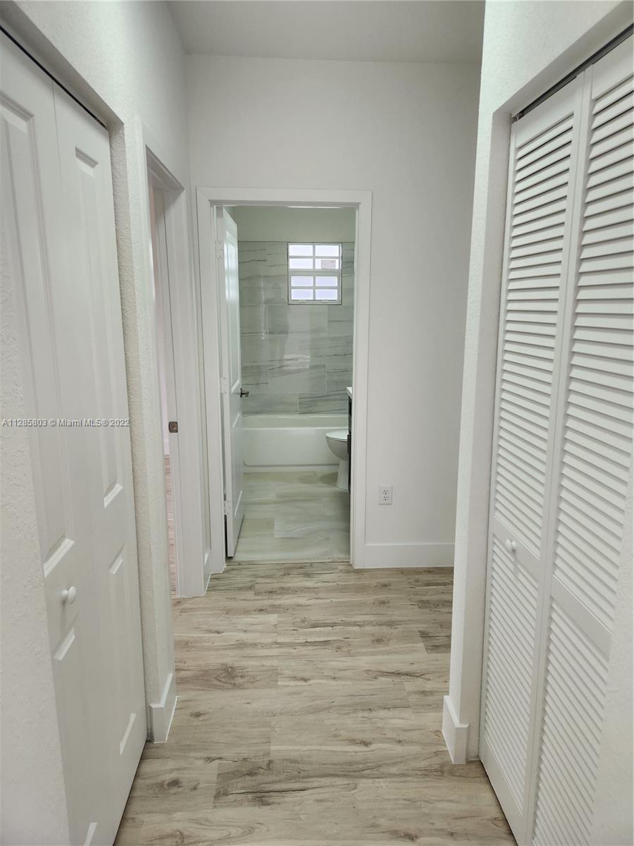 22065 Miami Avenue Miami, FL 33170 - Photo 17 of 27 a view of wooden door