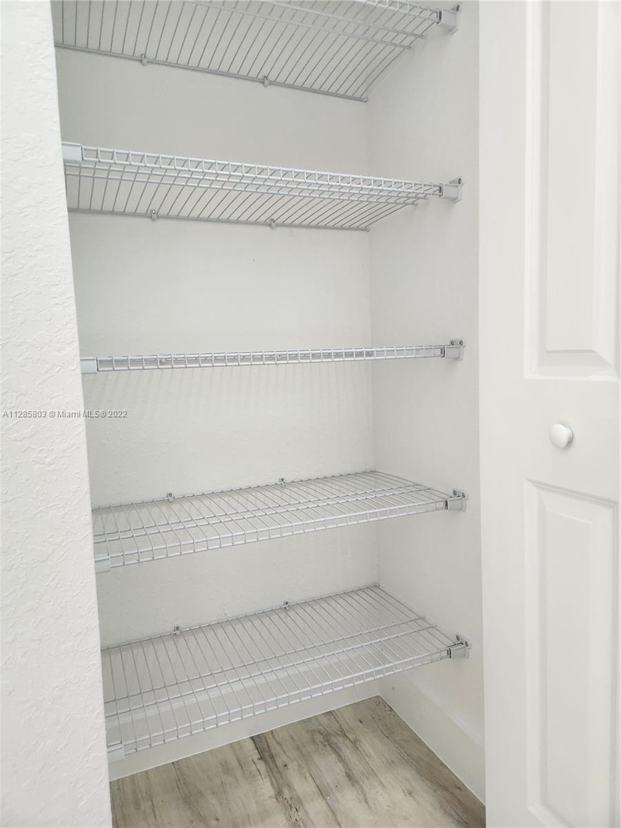 22065 Miami Avenue Miami, FL 33170 - Photo 24 of 27 a bathroom with a bathtub