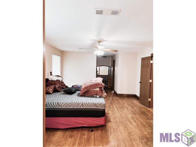 7747 Barbara Cohn Place Baton Rouge, LA 70811 - Photo 21 of 27 Primary Bedroom