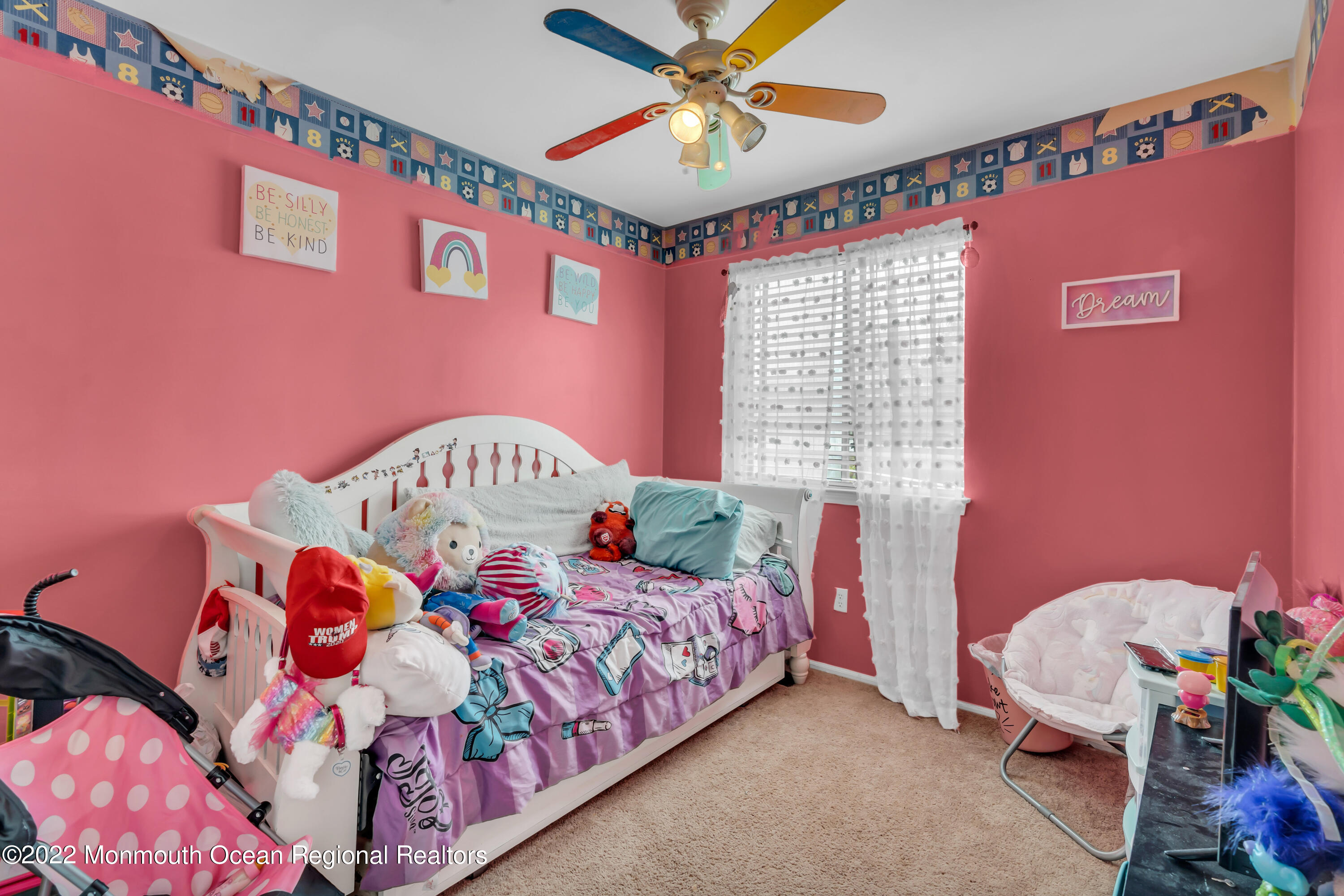 7 Jesse Drive Howell, NJ 07731 - Photo 11 of 25 a bedroom with a bed and a chandelier