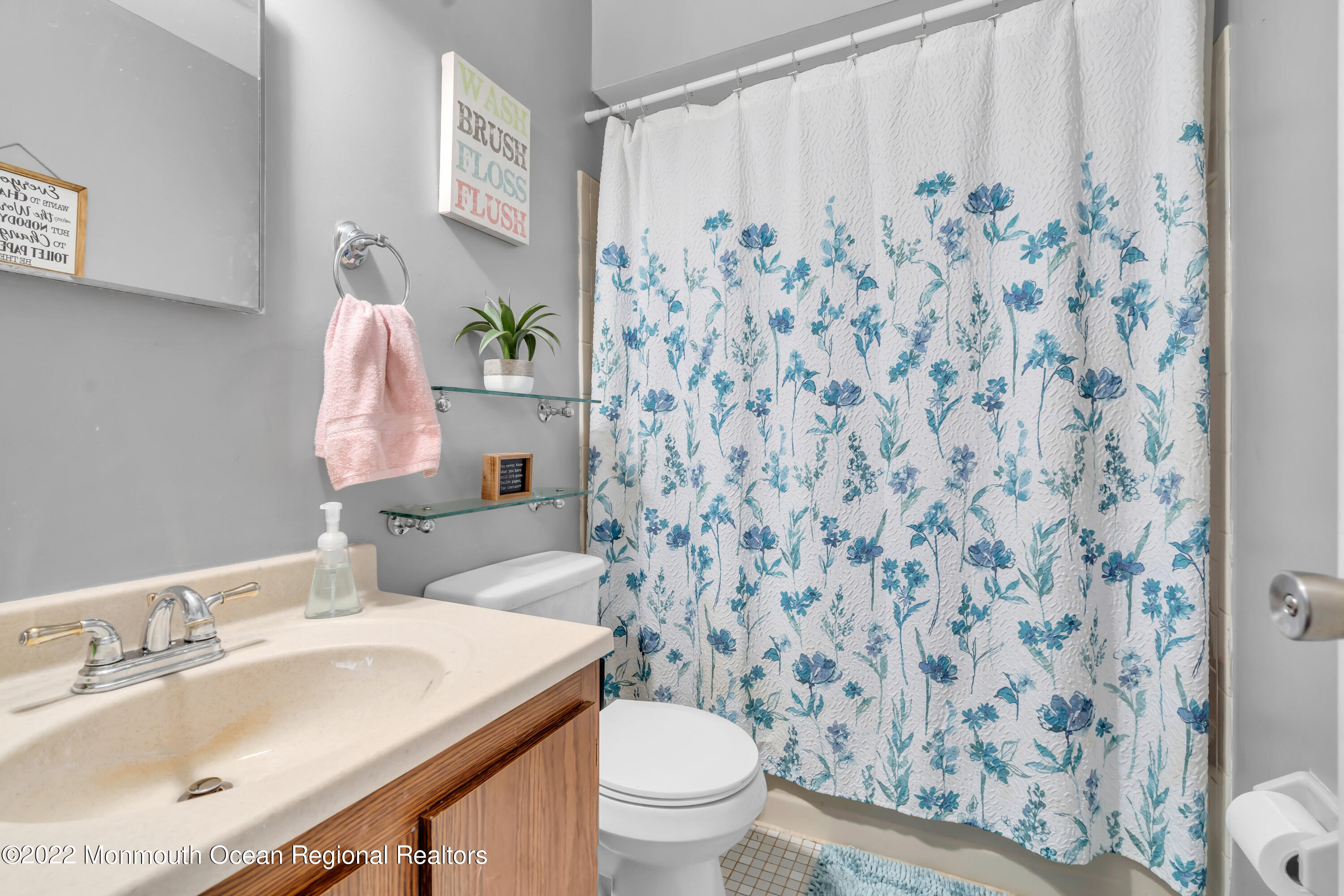 7 Jesse Drive Howell, NJ 07731 - Photo 15 of 25 a bathroom with a sink toilet and a mirror