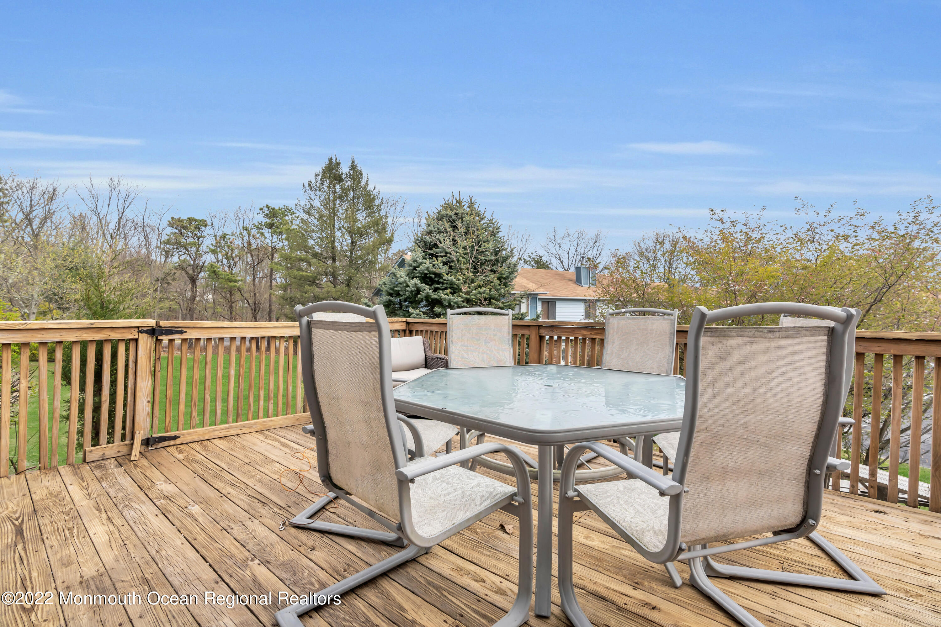 7 Jesse Drive Howell, NJ 07731 - Photo 21 of 25 a view of a chairs and table on the deck