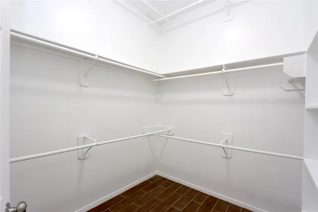 a view of an empty walk in closet