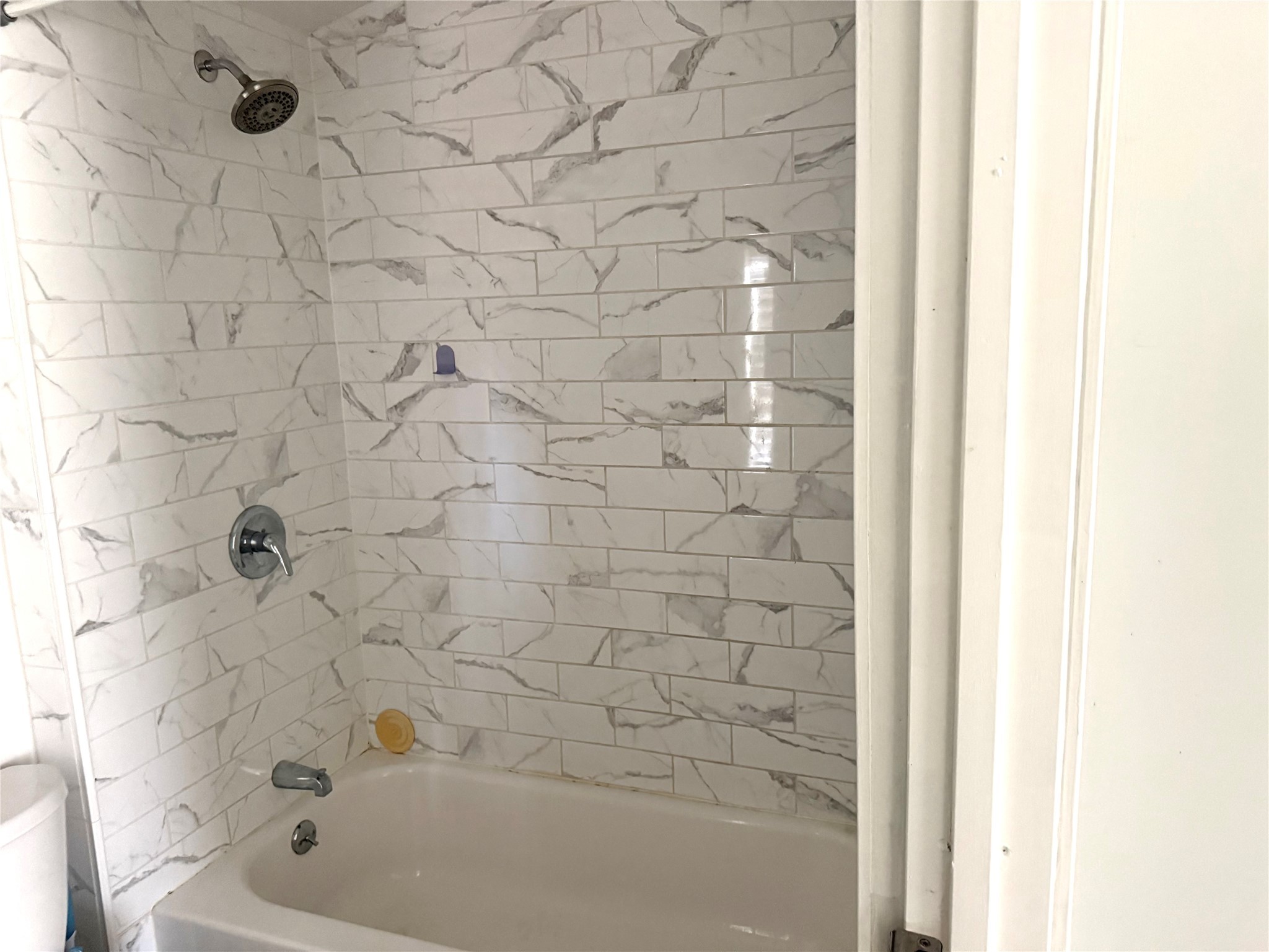 4730 Oleander Street Bacliff, TX 77518 - Photo 18 of 18 a bathroom with a bathtub