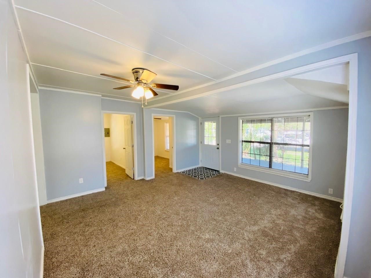 4730 Oleander Street Bacliff, TX 77518 - Photo 6 of 18 a view of an empty room with a window
