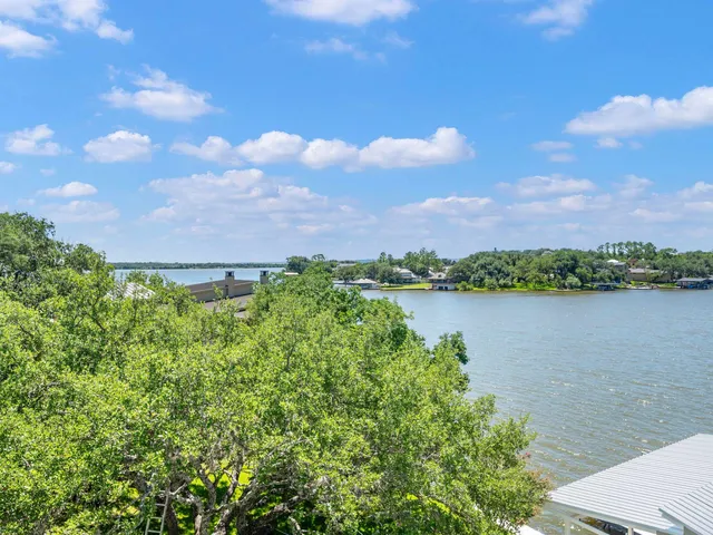 a view of a swimming pool with a terrace