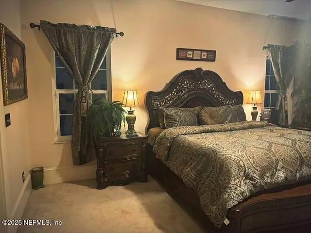 a bedroom with a bed and a walk in closet