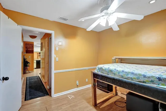 a room with table and flowerpot