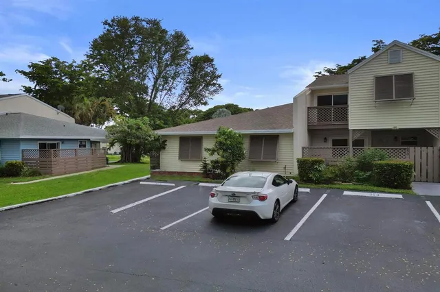 a view of a house with a garden