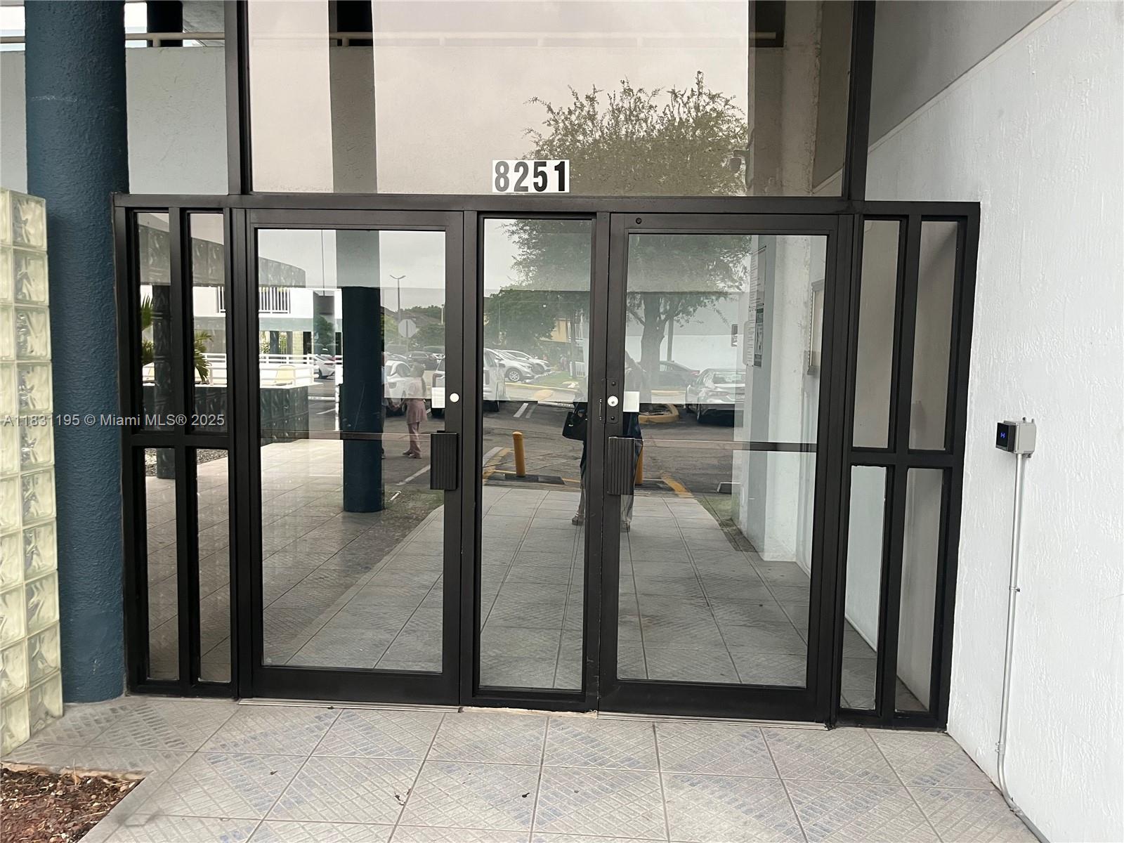 8251 Northwest 8th Street, Unit 214 Miami, FL 33126 - Photo 18 of 19 a view of a glass door