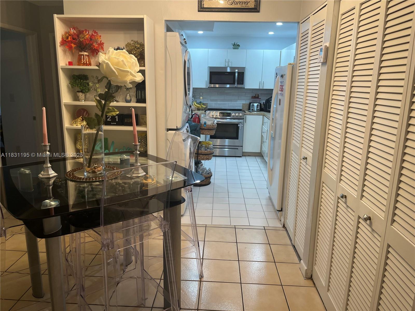 8251 Northwest 8th Street, Unit 214 Miami, FL 33126 - Photo 9 of 19 a view of a hallway with living room