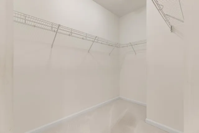 a view of a room with racks on the wall