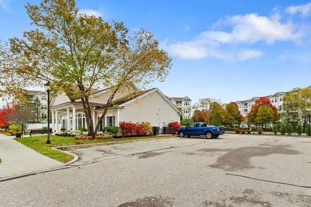 a view of road with houses