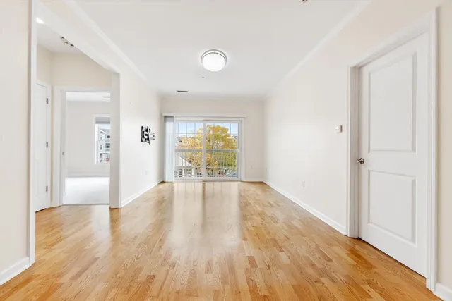 a view of an empty room and window