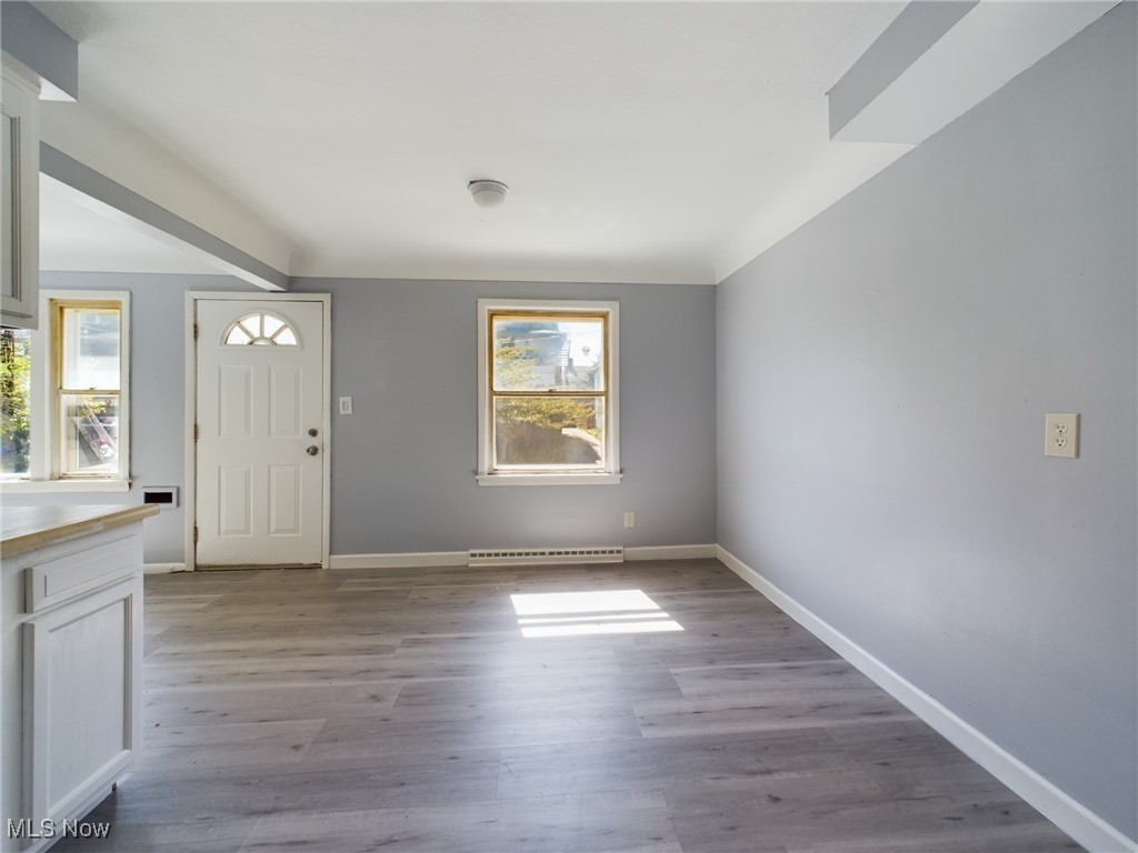 793 Alhambra Road Cleveland, OH 44110 - Photo 12 of 25 Foyer entrance featuring light hardwood / wood-style floors