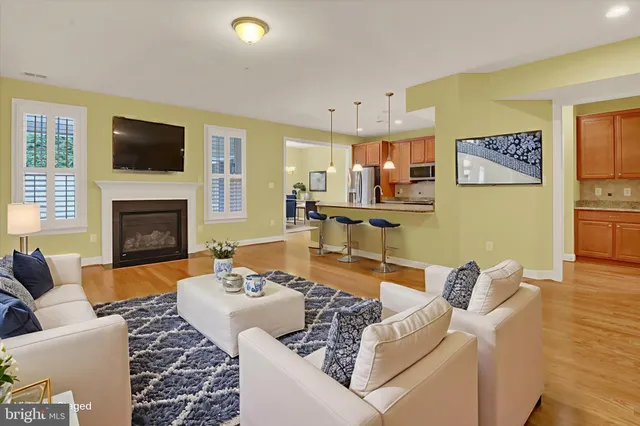 a view of an empty room with windows