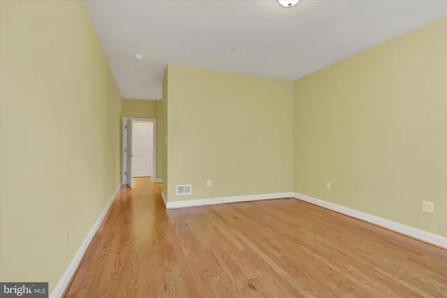 a view of a big room with wooden floor
