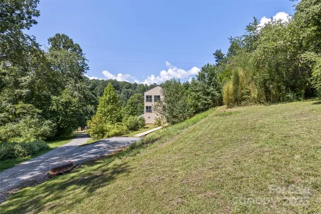 a view of backyard with green space