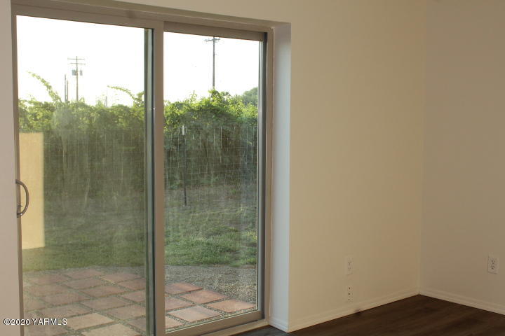 440 Gurley Road Granger, WA 98932 - Photo 12 of 25 a bathroom with a glass shower door