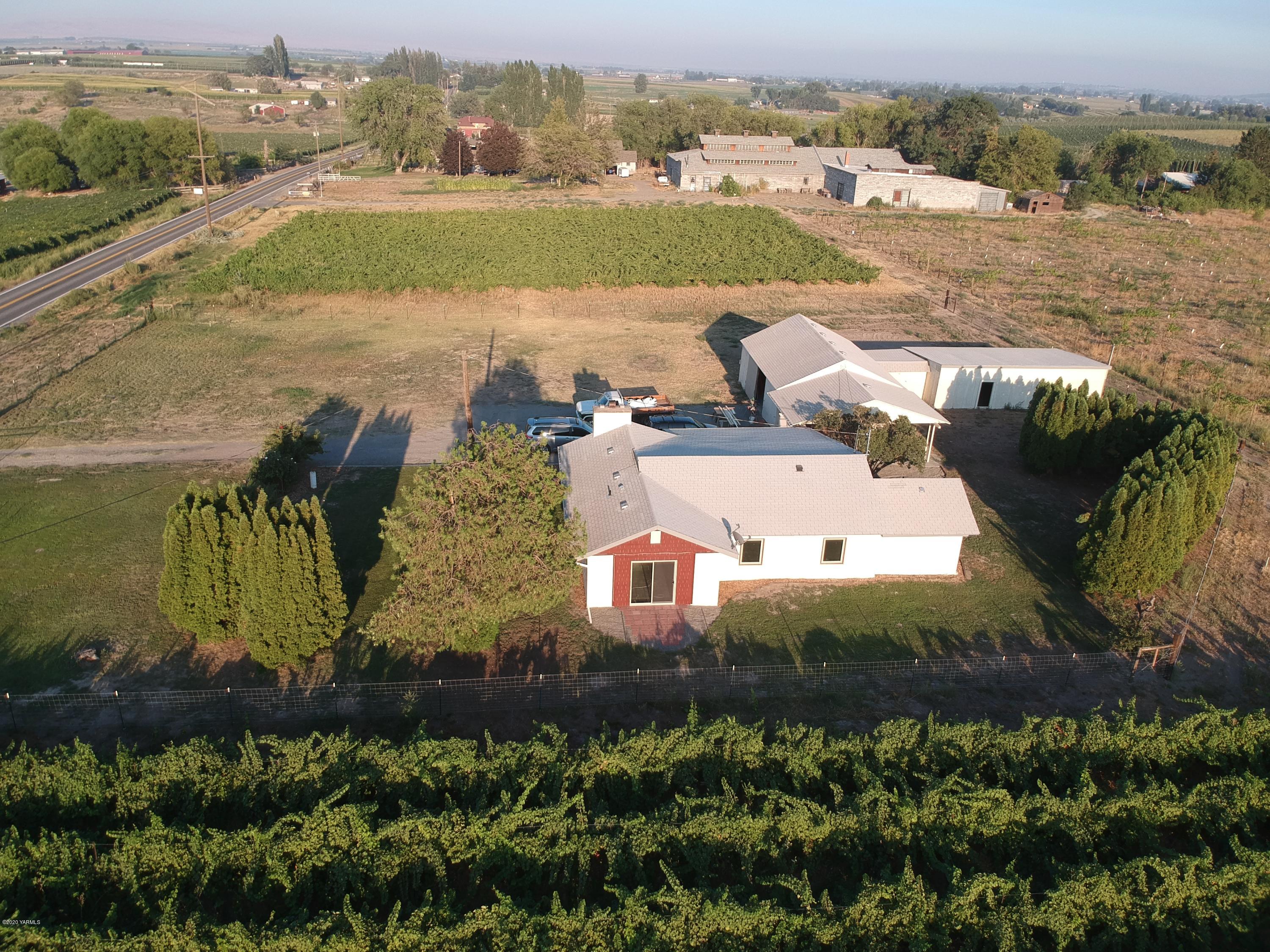 440 Gurley Road Granger, WA 98932 - Photo 20 of 25 an aerial view of a house with a yard basket ball court and outdoor seating