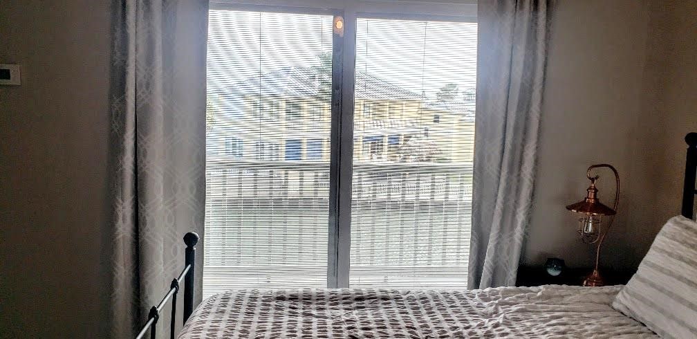 2290 North Fulton Beach Road, Unit B317 Rockport, TX 78382 - Photo 16 of 40 a view of a bedroom with a window