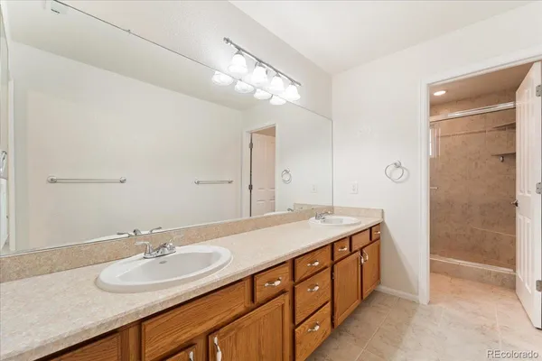 a room with a sink and a mirror