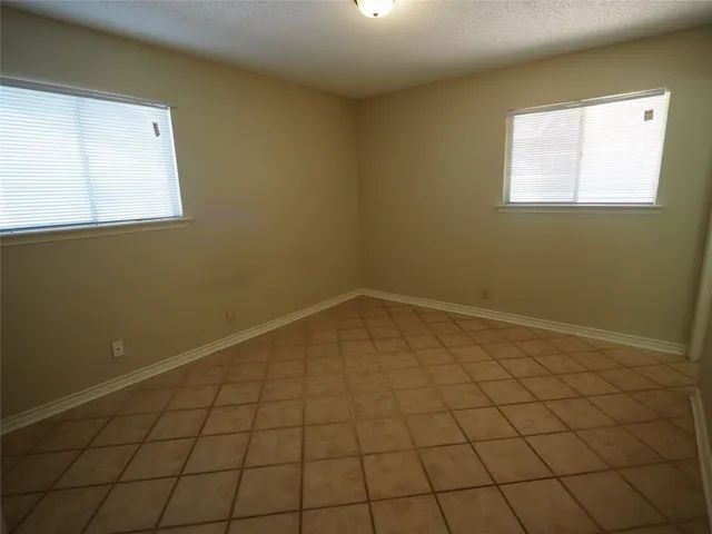 a view of a room that has a window in it