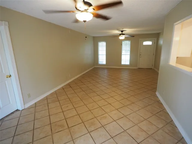 a view of an empty room and window