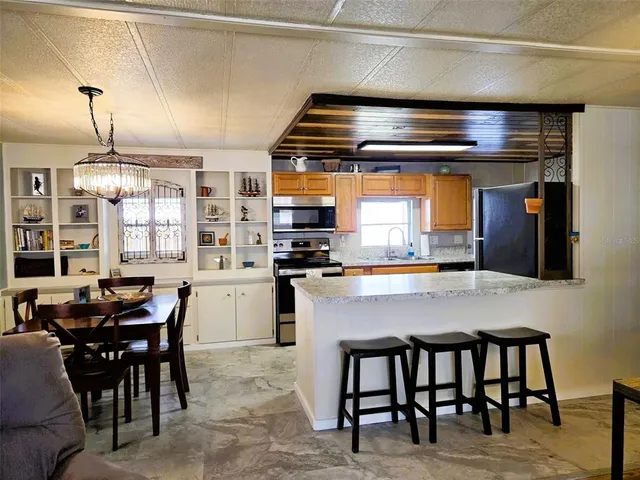 a bedroom with a bed and furniture