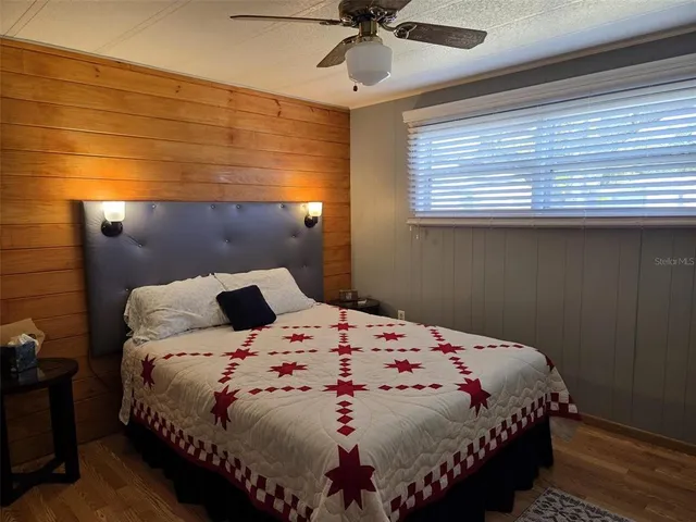 a bathroom with a sink toilet and mirror