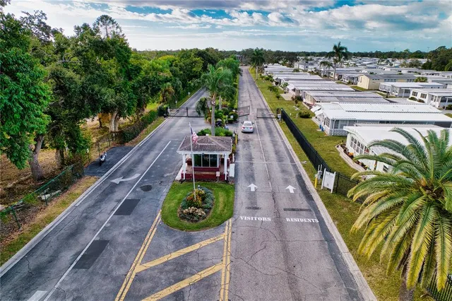 an aerial view of a house with a garden