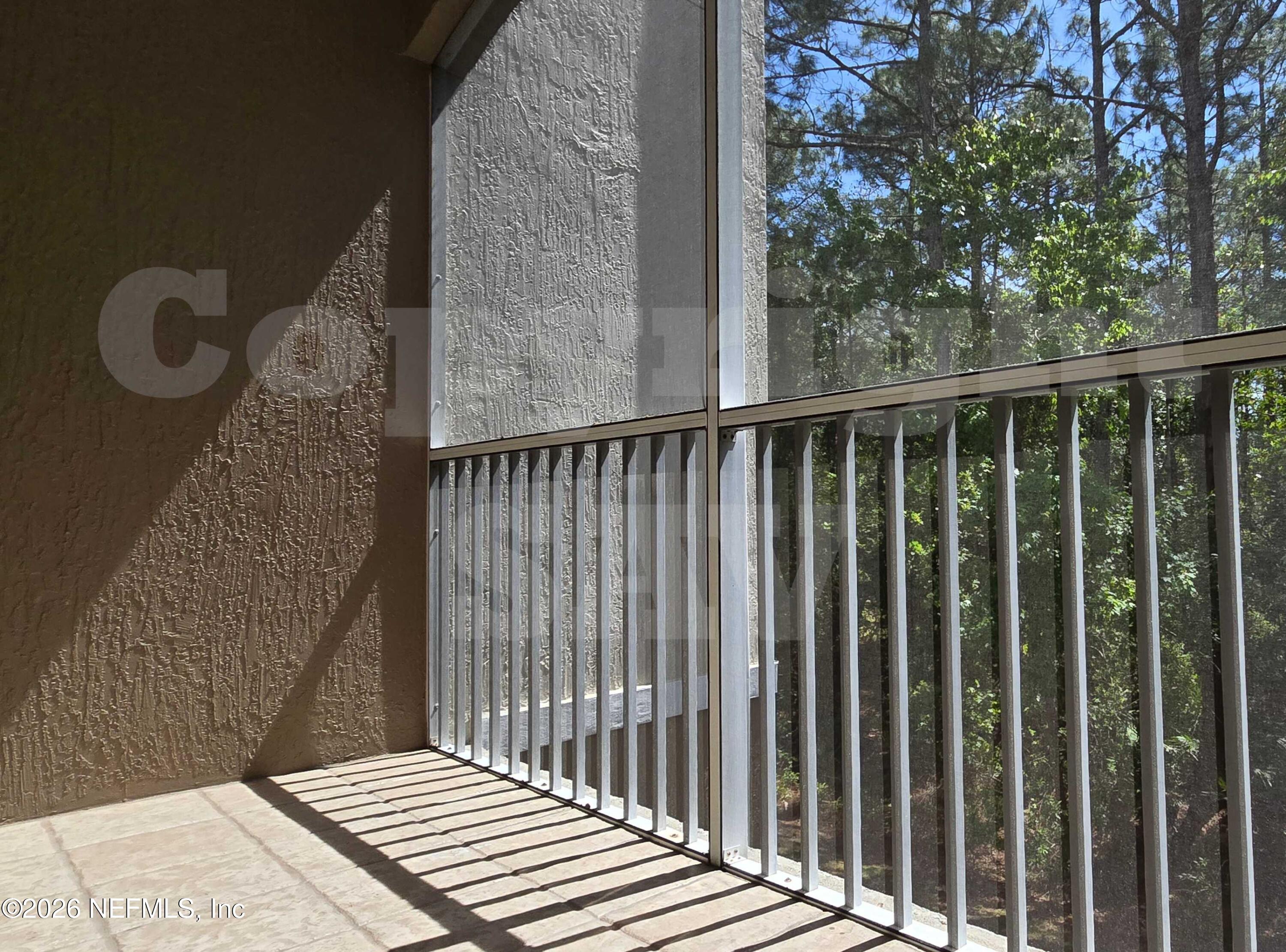 10550 Baymeadows Road, Unit 522 Jacksonville, FL 32256 - Photo 19 of 25 a view of a balcony with wooden floor