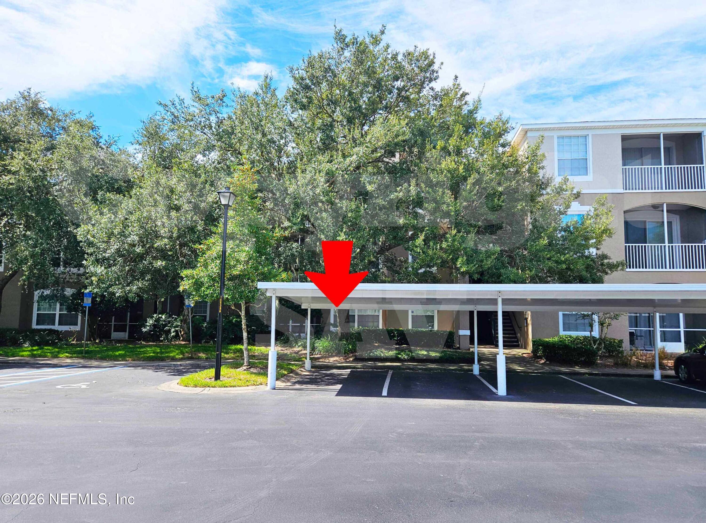 10550 Baymeadows Road, Unit 522 Jacksonville, FL 32256 - Photo 20 of 25 a view of a house with a swimming pool