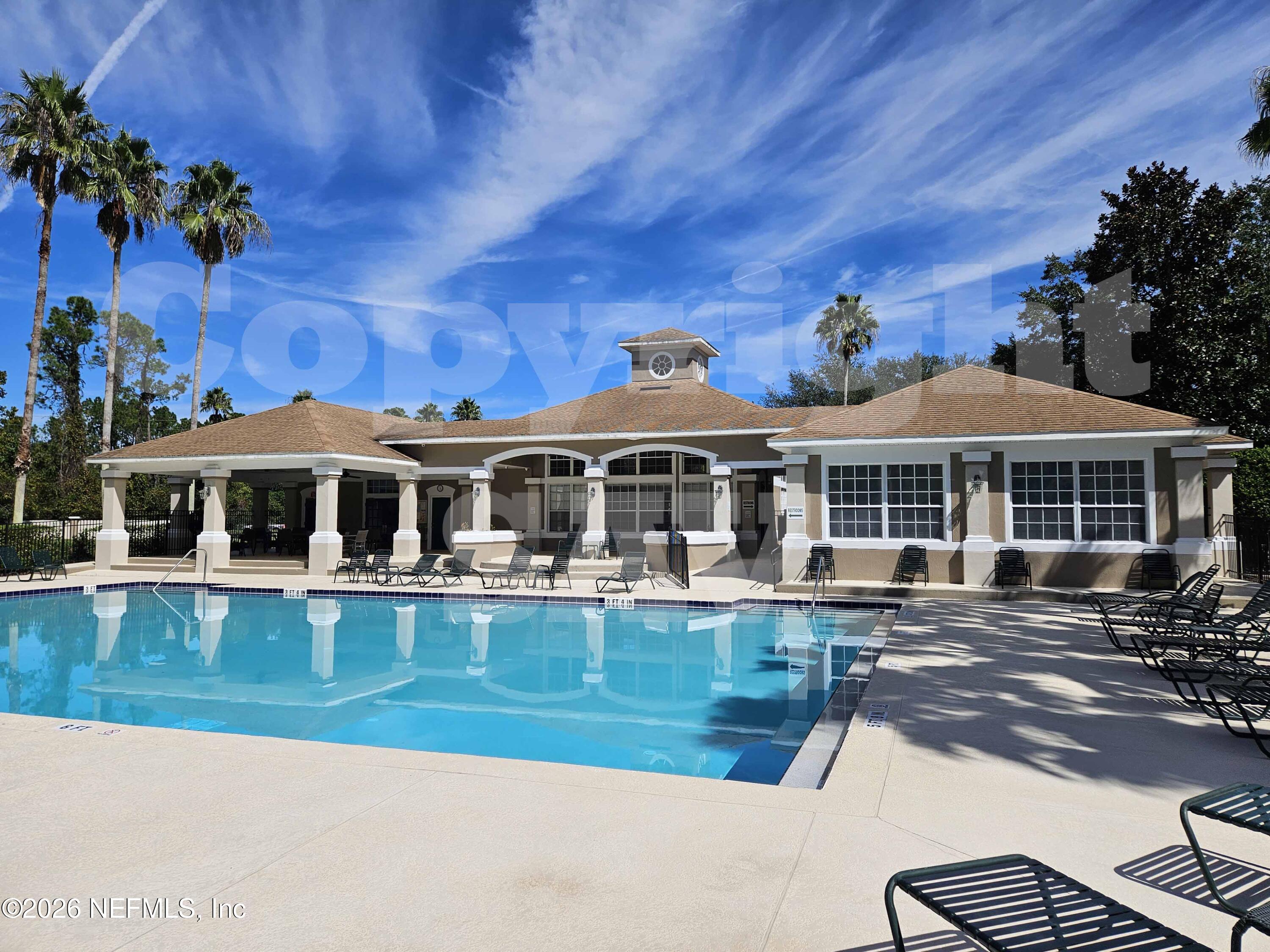 10550 Baymeadows Road, Unit 522 Jacksonville, FL 32256 - Photo 23 of 25 a front view of a house with swimming pool