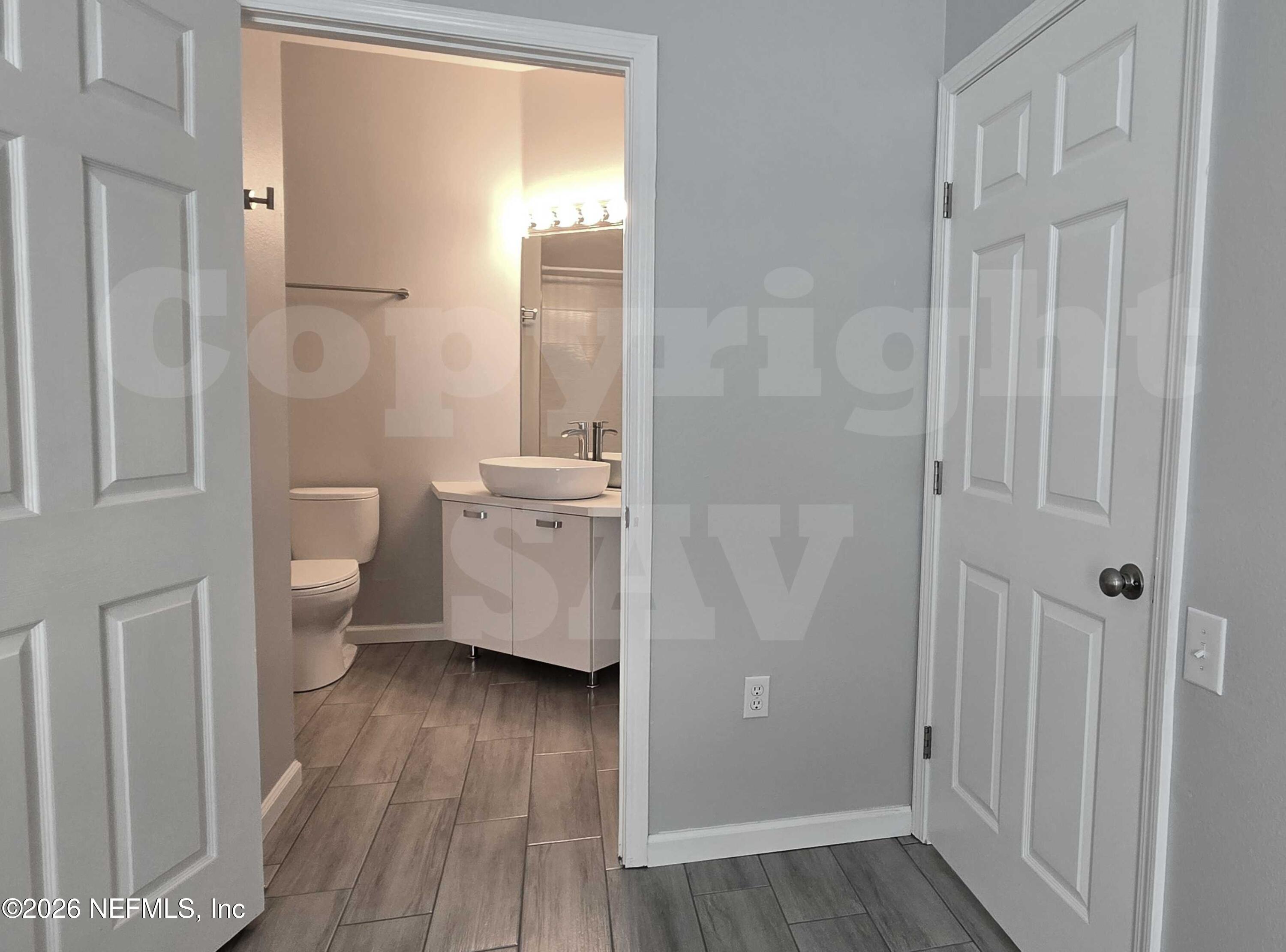10550 Baymeadows Road, Unit 522 Jacksonville, FL 32256 - Photo 10 of 25 a bathroom with a sink a toilet and shower