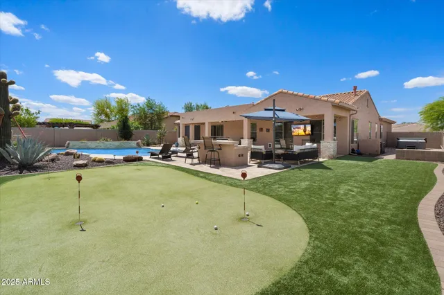 a view of a house with a swimming pool