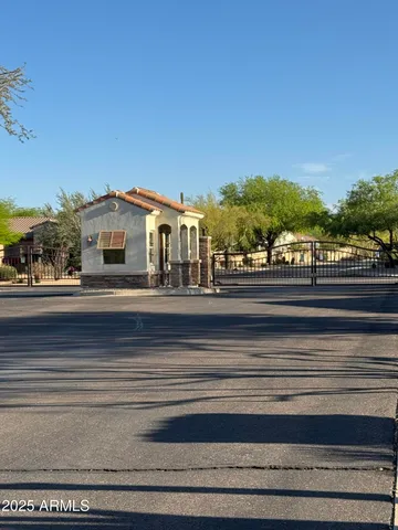 a view of a house with a balcony and door