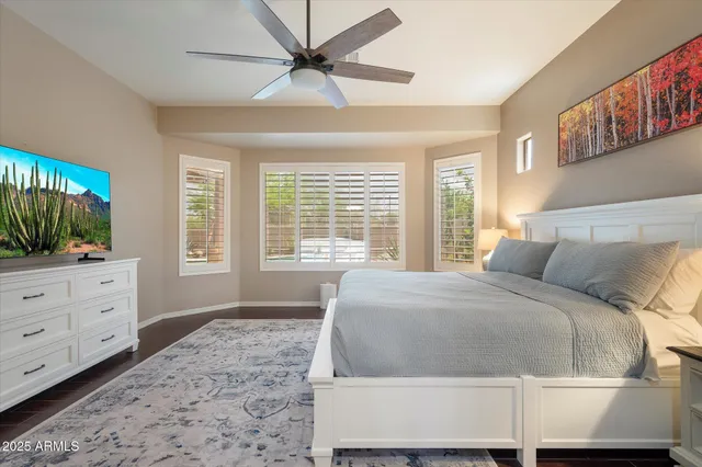 a bed room with a bed and a window