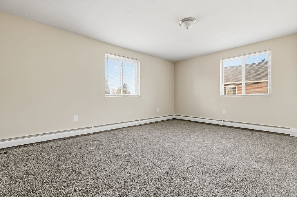 1801 Ocean Street, Unit B31 Marshfield, MA 02050 - Photo 9 of 17 an empty room with a empty space and window