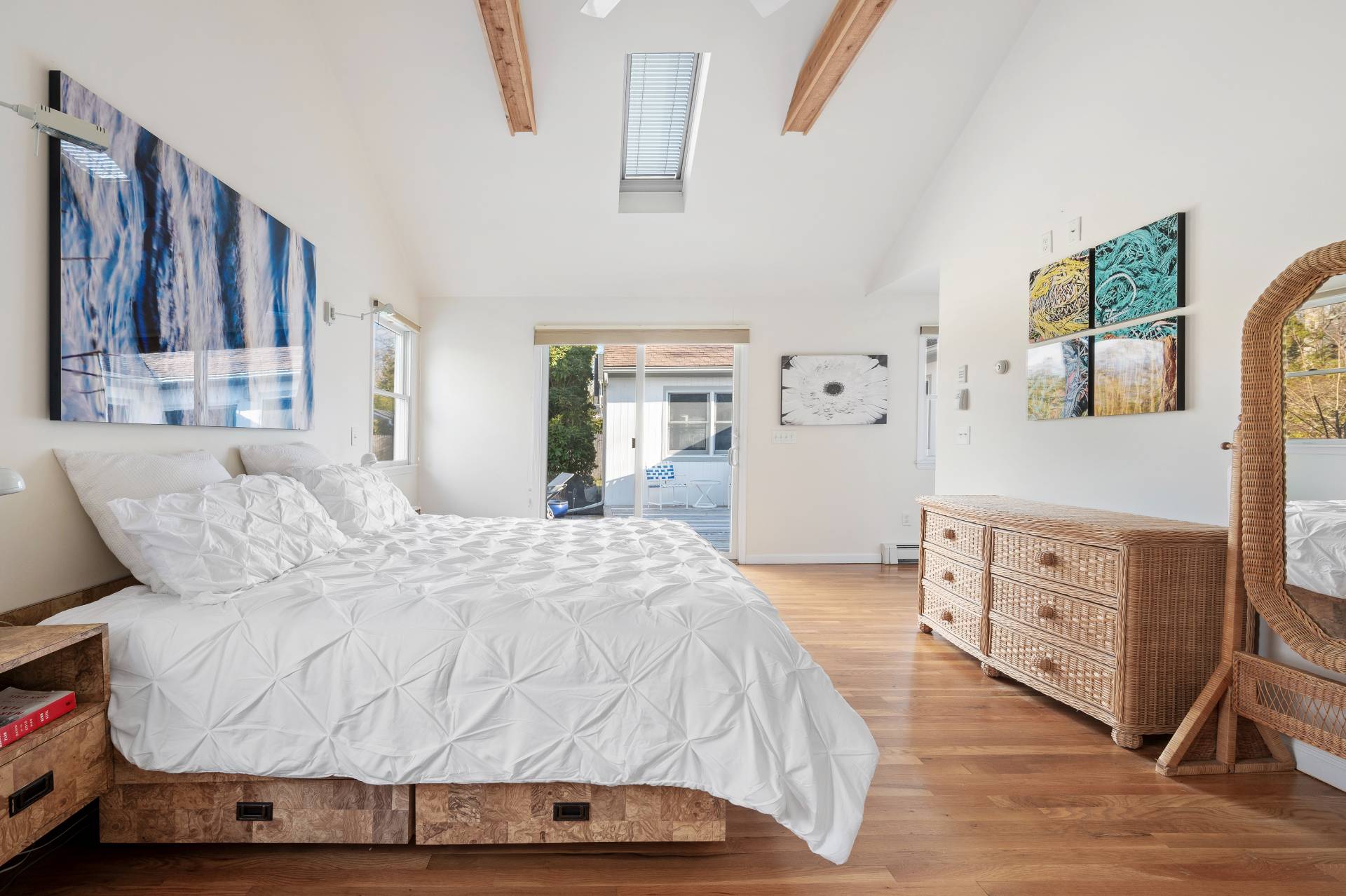 25 Lynncliff Road Hampton Bays, NY 11946 - Photo 13 of 24 a bedroom with a bed and dresser
