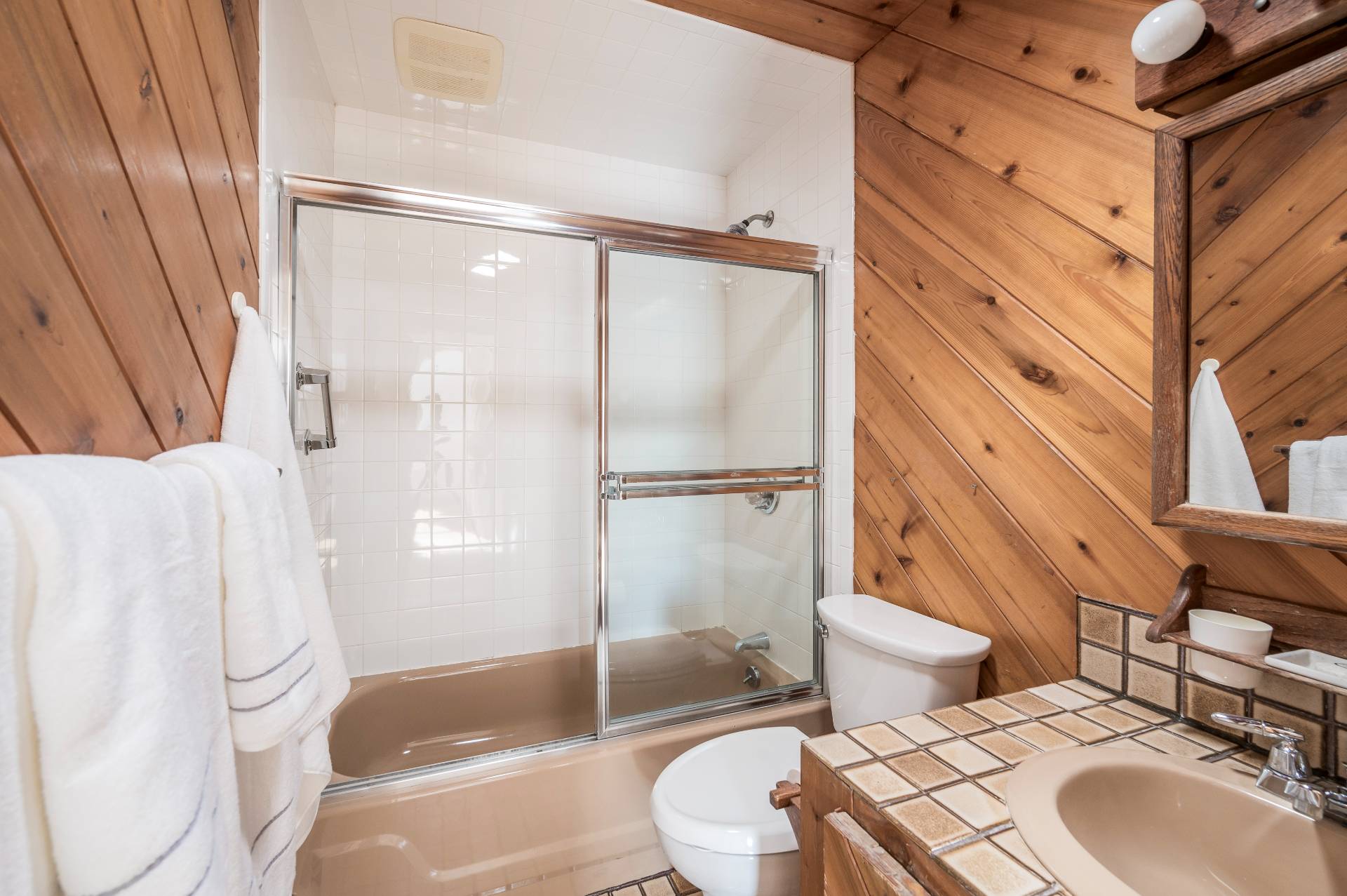 25 Lynncliff Road Hampton Bays, NY 11946 - Photo 19 of 24 a bathroom with a sink toilet and shower