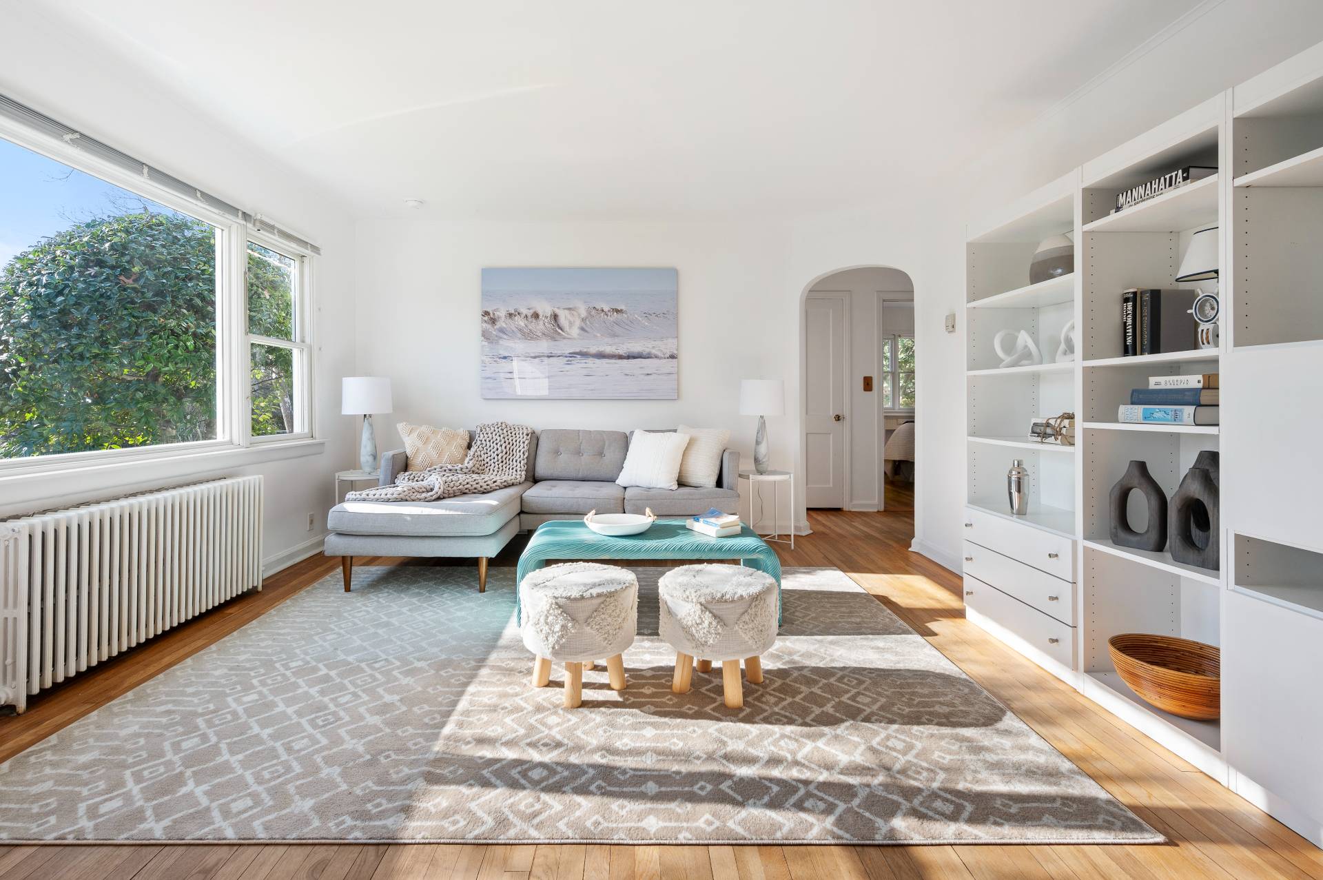 25 Lynncliff Road Hampton Bays, NY 11946 - Photo 4 of 24 a living room with furniture and a rug