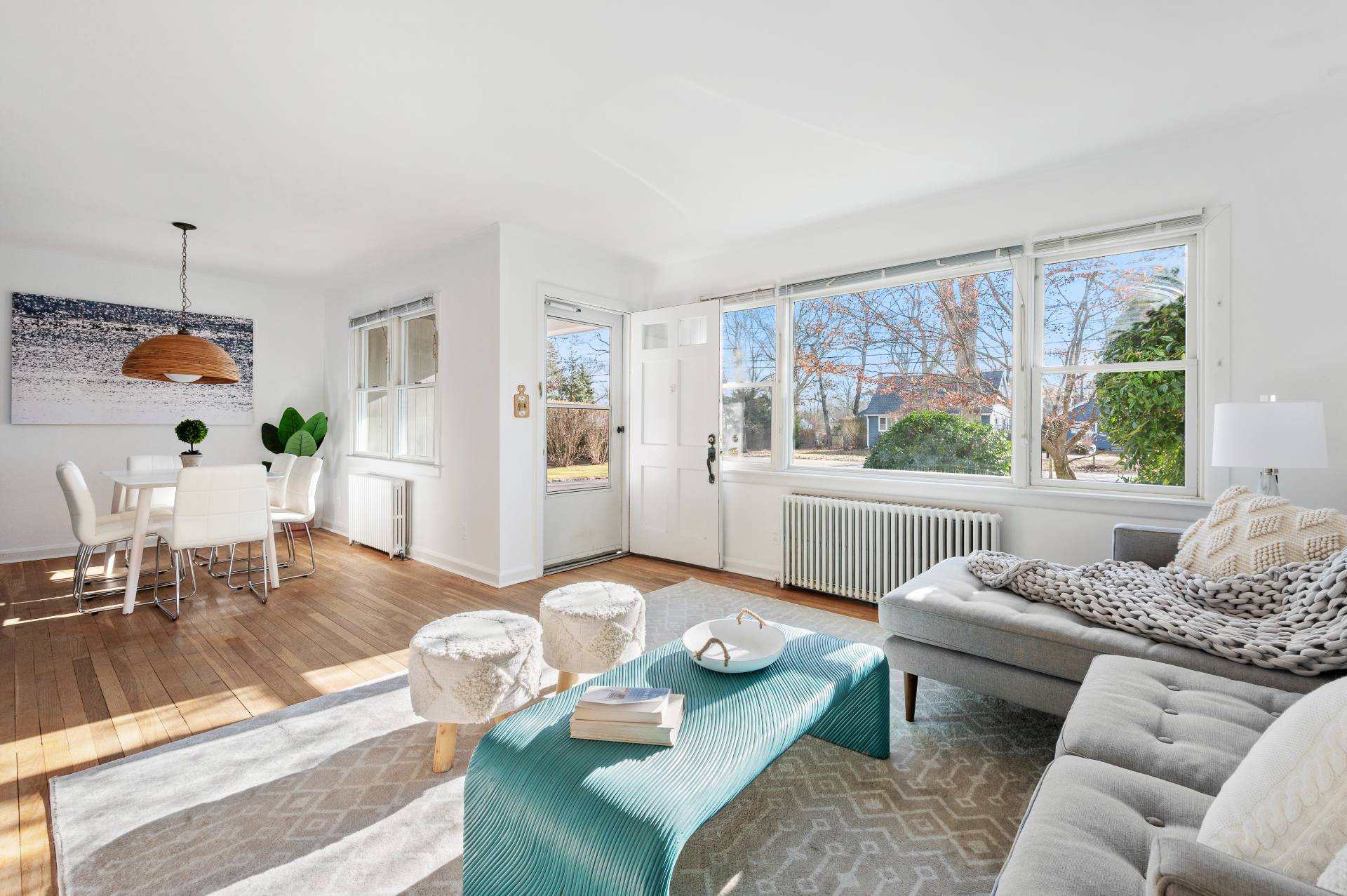 25 Lynncliff Road Hampton Bays, NY 11946 - Photo 5 of 24 a living room with furniture and a table