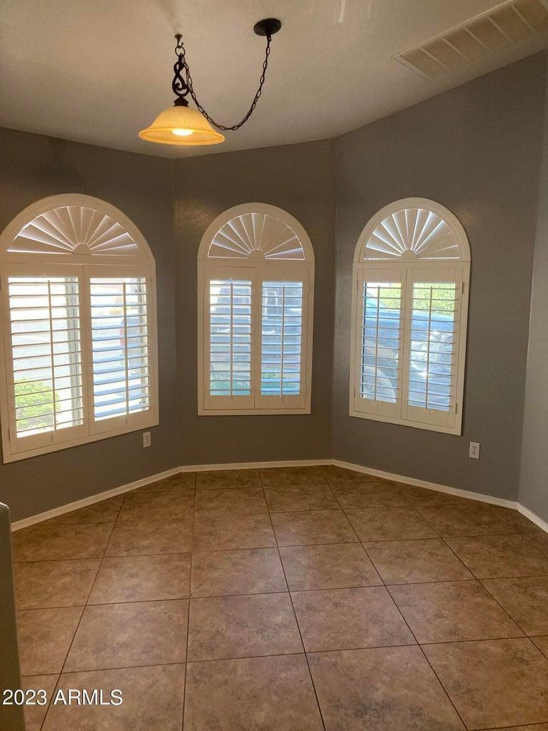 16645 North 19th Street Phoenix, AZ 85022 - Photo 3 of 11 a view of an empty room with windows
