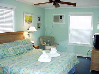 921 Center Street, Unit 1 Key West, FL 33040 - Photo 6 of 7 a living room with furniture and a window