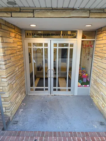 a view of a door with glass windows